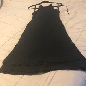 Little black with flirty ruffle two-tiered hem.